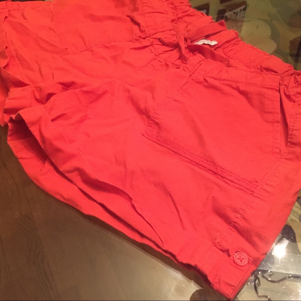 Medium Pea in the Pod shorts. A bright orange red